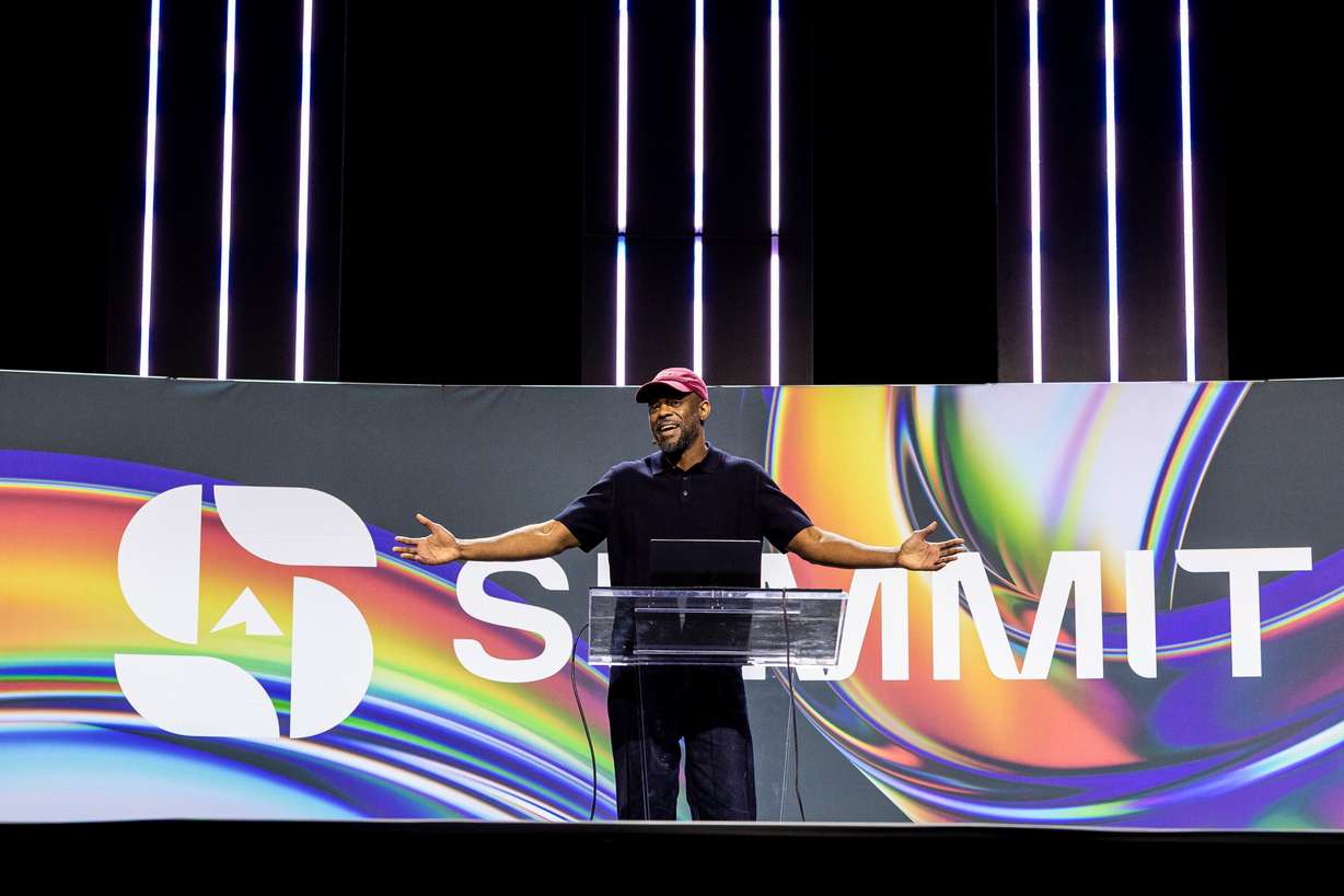 Willonius Hatcher, an AI storyteller known as King Willonius, speaks during the Silicon Slopes Summit at the Salt Palace Convention Center in Salt Lake City on Thursday.