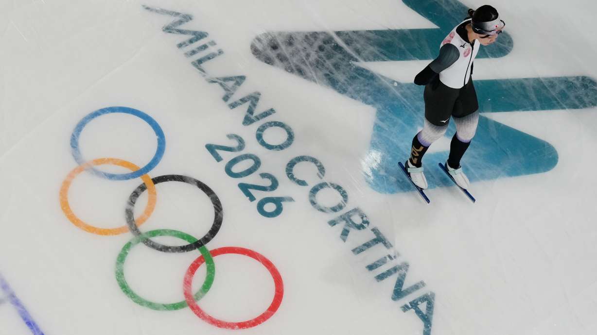 An athlete from Japan trains inside the speed skating venue at the 2026 Winter Olympics, in Milan, Italy, Thursday, Feb. 5, 2026.