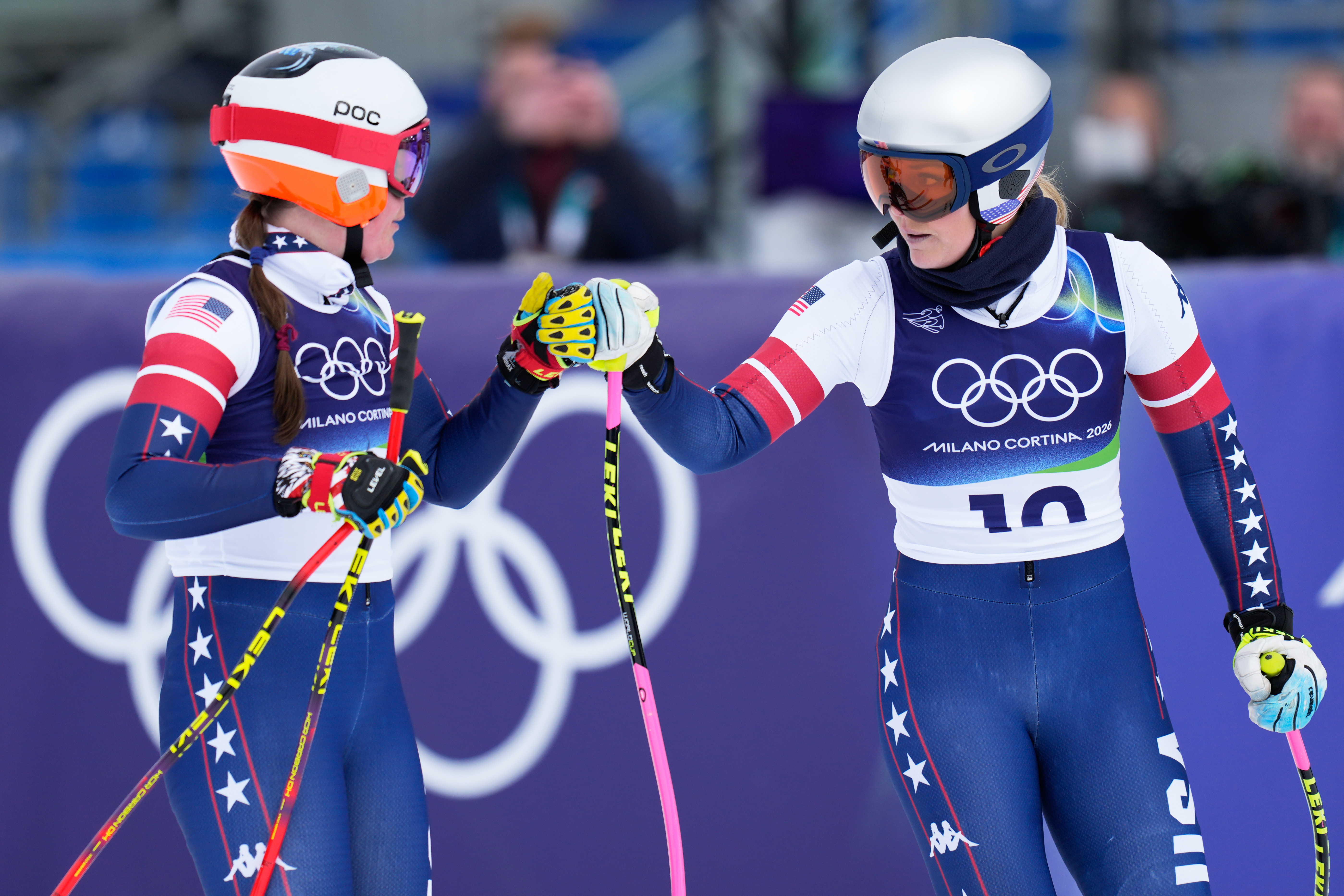 United States' Lindsey Vonn, right, and Breezy Johnson at the finish area during an alpine ski, women's downhill official training, at the 2026 Winter Olympics, in Cortina d'Ampezzo, Italy, Friday, Feb. 6, 2026. 