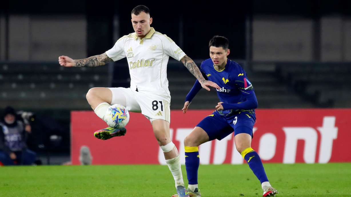 Pisa's Filip Stojilkovic, left, controls the ball as Verona's Tobias Slotsager defends during the Serie A soccer match between Hellas Verona and Pisa, Friday, Feb. 6 , 2026, in Verona, Italy.