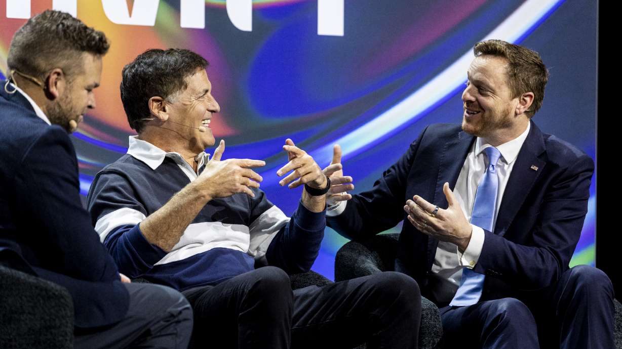 Mark Cuban, co-founder of Cost Plus Drugs and businessman, center, talks with Chris Klomp, director of the Center for Medicare within the U.S. Department of Health and Human Services, during the Silicon Slopes Summit in Salt Lake City Friday.