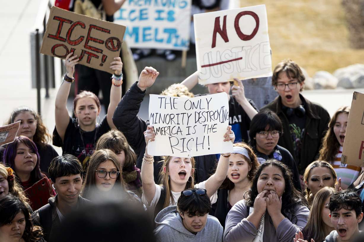 West High sophomore Alice Trentelman cheers as she and fellow West High School students protest against ICE during a walkout from their school to the Capitol in Salt Lake City on Friday.