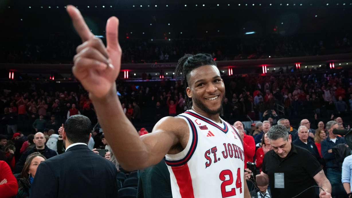 St. John's forward Zuby Ejiofor smiles after defeating UConn in an NCAA college basketball game Friday, Feb. 6, 2026, in New York.