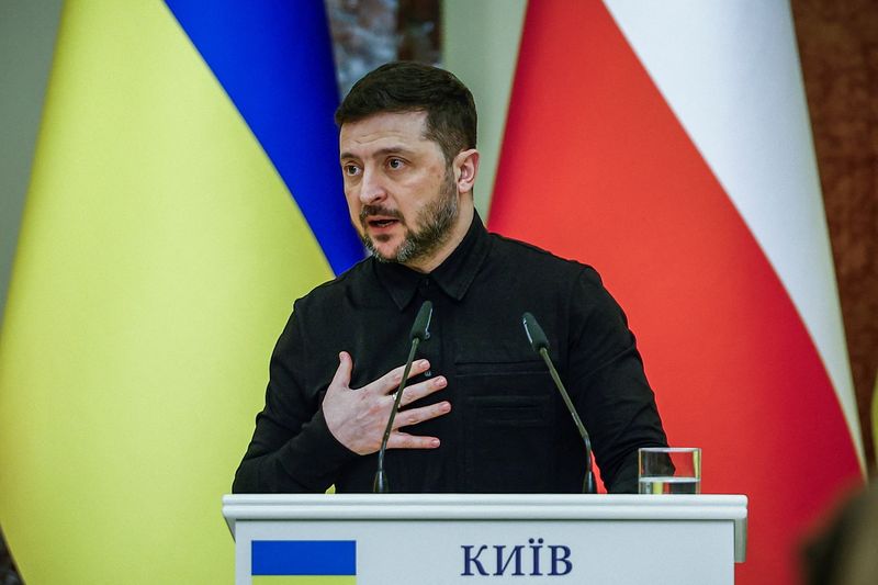Ukrainian President Volodymyr Zelenskiy speaks during a joint press conference with Polish Prime Minister Donald Tusk (not pictured), amid Russia's attack on Ukraine, in Kyiv, Ukraine, Thursday. 
