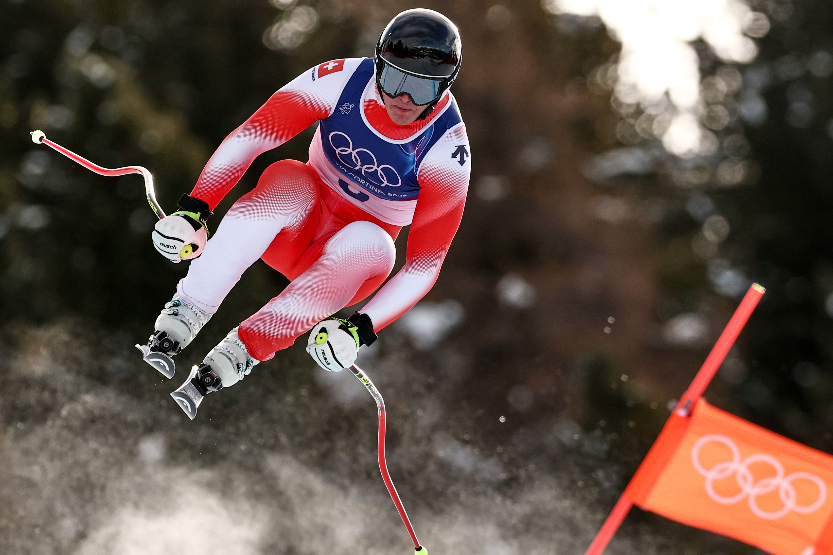 Switzerland's Franjo von Allmen speeds down the course during an alpine ski, men's downhill race, at the 2026 Winter Olympics, in Bormio, Italy, Saturday, Feb. 7, 2026. 
