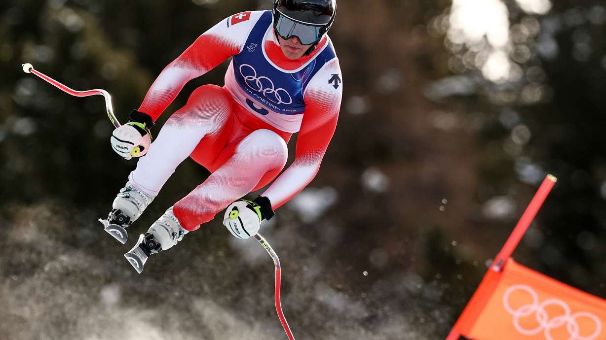 Switzerland's Franjo von Allmen speeds down the course during an alpine ski, men's downhill race, at the 2026 Winter Olympics, in Bormio, Italy, Saturday, Feb. 7, 2026.