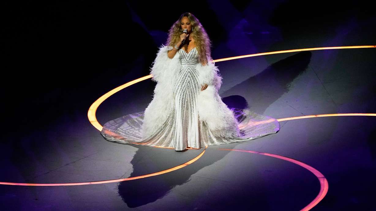 Singer Mariah Carey performs during the Olympic opening ceremony at the 2026 Winter Olympics, in Milan, Italy, Friday, Feb. 6, 2026.