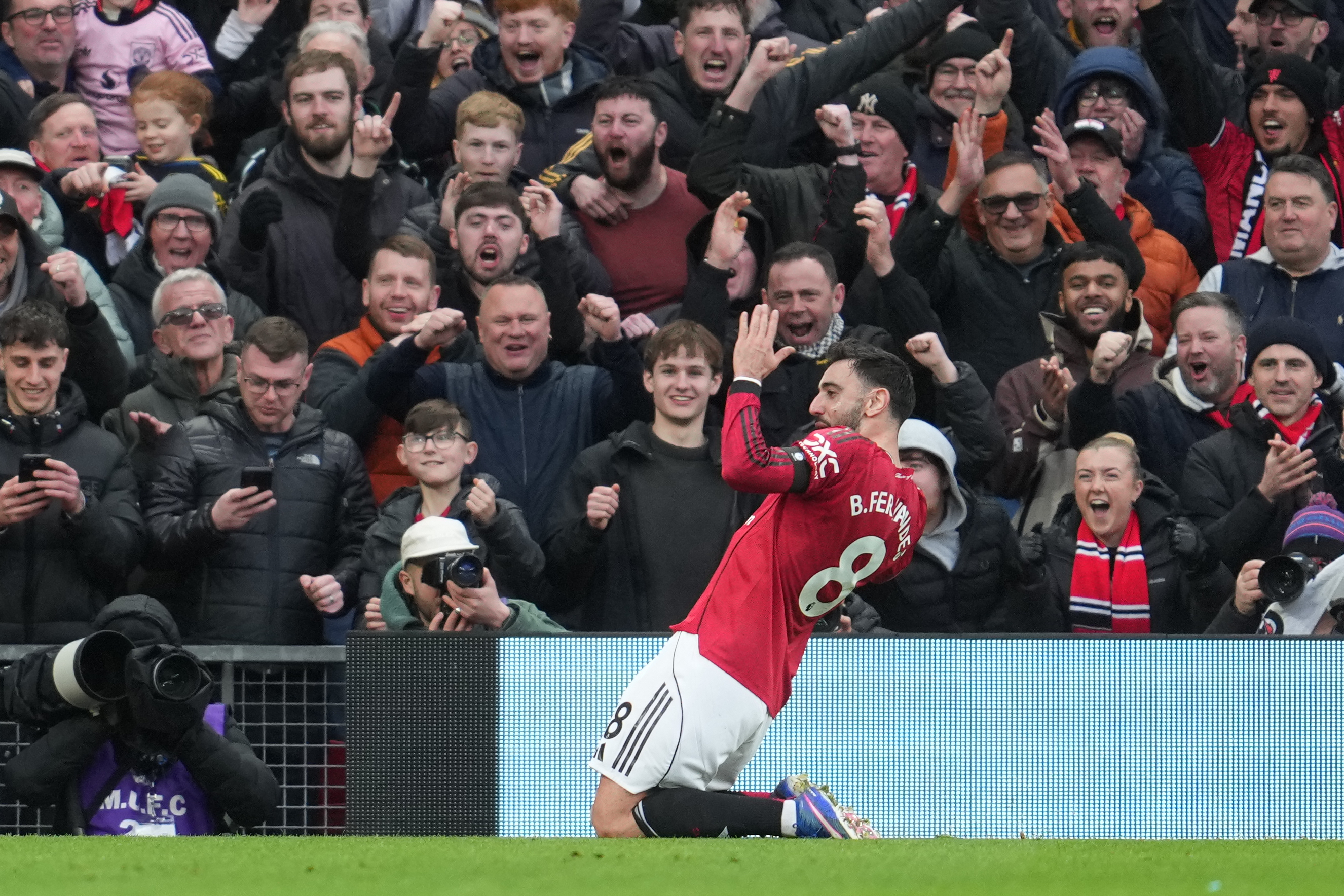 Manchester United's Bruno Fernandes celebrates after scoring during the English Premier League soccer match between Manchester United and Tottenham in Manchester, England, Saturday, Feb. 7, 2026. 