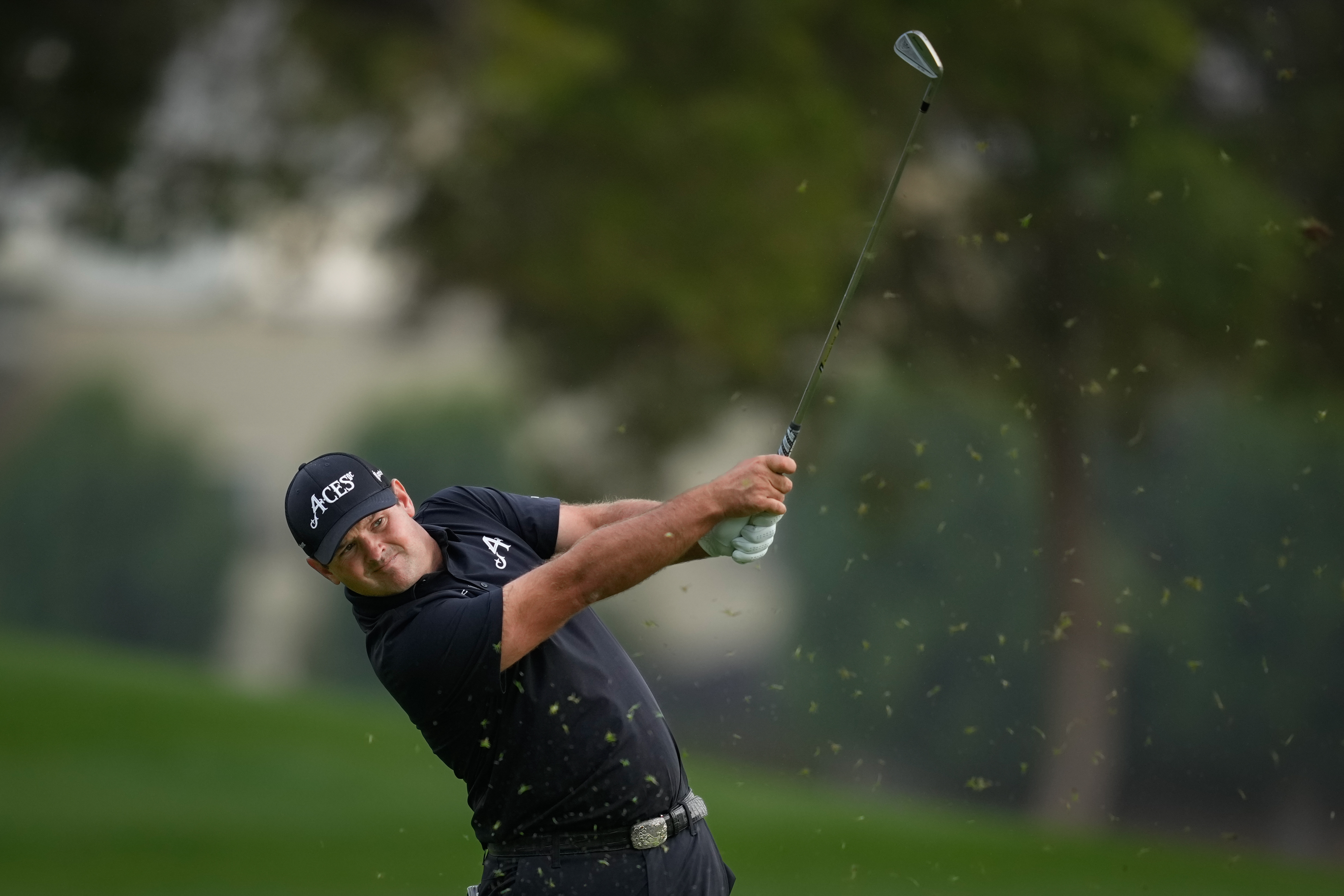 Patrick Reed of the United States plays his second shot on the 18th hole during the final round of the Dubai Desert Classic in United Arab Emirates, Sunday, Jan. 25, 2026. 