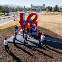 'LOVE' — with a slanted 'O': University of Utah welcomes massive iconic sculpture to campus