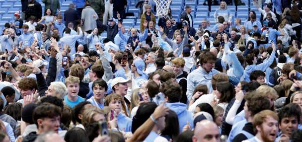 Duke's Scheyer says staff members 'got punched in the face' during court-storming; UNC AD apologizes