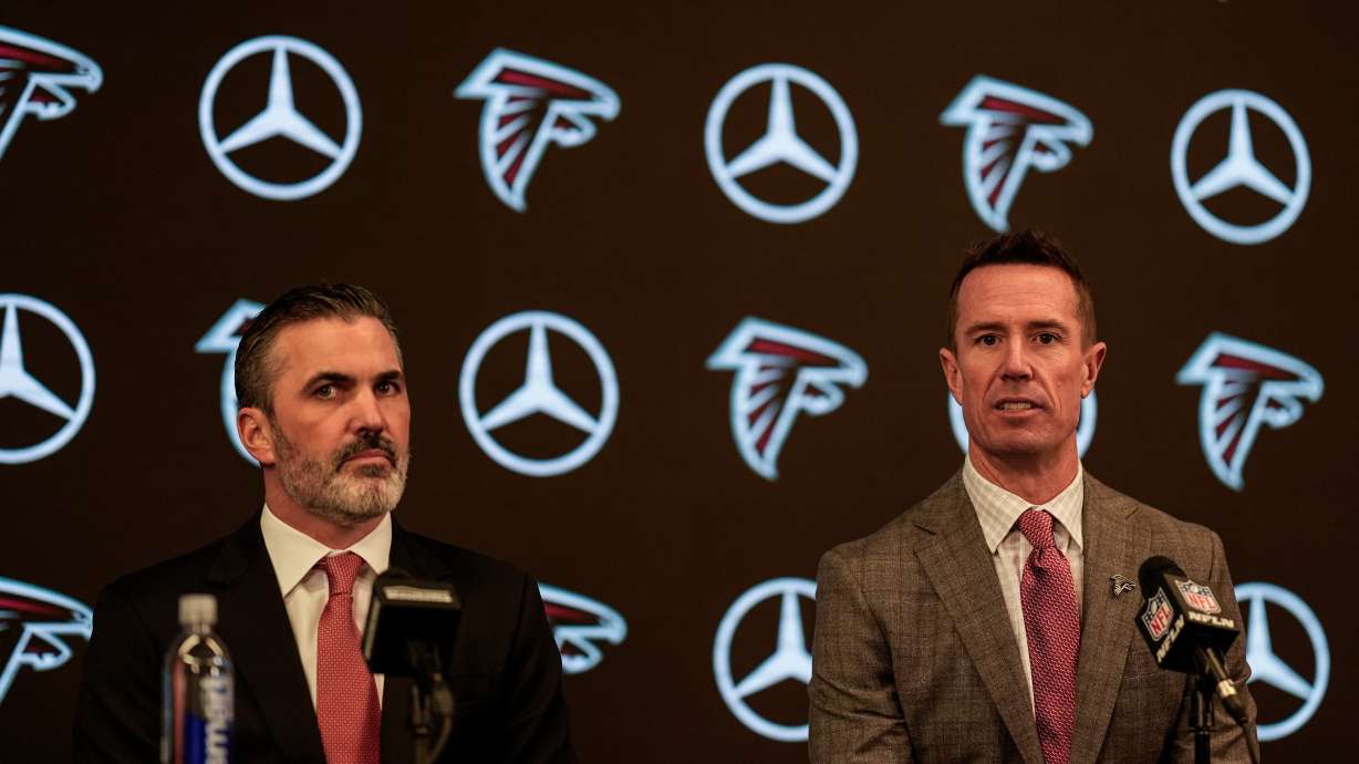 New Atlanta Falcons head coach Kevin Stefanski, left, speaks as Atlanta Falcons President of Football Matt Ryan looks on during a NFL news conference, Tuesday, Jan. 27, 2026, in Atlanta.