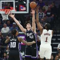 Harden scores 23 in Cavaliers debut, Mitchell leads with 35 in 132-126 win over Kings