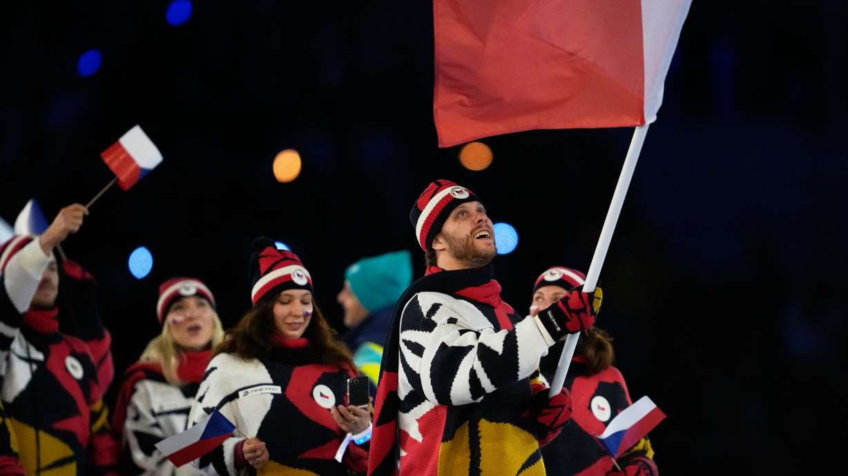 David Pastrnak, flag bearer of Czechia arrives during the Olympic opening ceremony at the 2026 Winter Olympics, in Milan, Italy, Friday, Feb. 6, 2026.