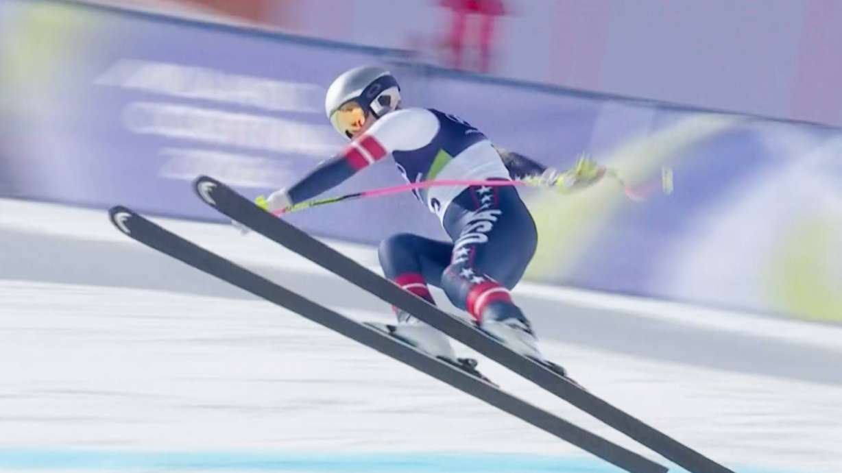 In this image taken from video provided by Olympic Broadcasting Services, OBS, United States' Lindsey Vonn crashes during an alpine ski women's downhill race, at the 2026 Winter Olympics, in Cortina d'Ampezzo, Italy, Sunday, Feb. 8, 2026.