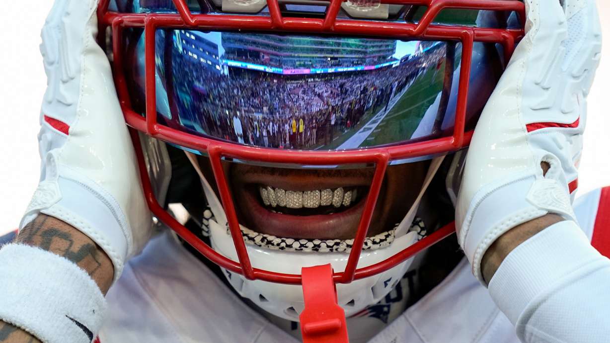 New England Patriots wide receiver DeMario Douglas warms up before the NFL Super Bowl 60 football game Seattle Seahawks, Sunday, Feb. 8, 2026, in Santa Clara, Calif.