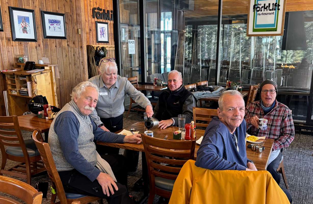 Nearly 200 years of skiing is represented by Dave Powers, Paul Gongaware, Curtis Kreutzberg and Steve Camerota as they take a break at the Forklift restaurant at Snowbird. Powers is almost never alone when he comes to the Forklift.