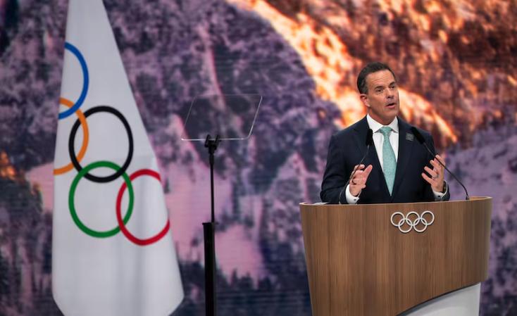Brad Wilson, CEO of the Organizing Committee for the 2034 Olympic and Paralympic Winter Games, speaks to the IOC during Utah’s presentation in Milan on Tuesday.