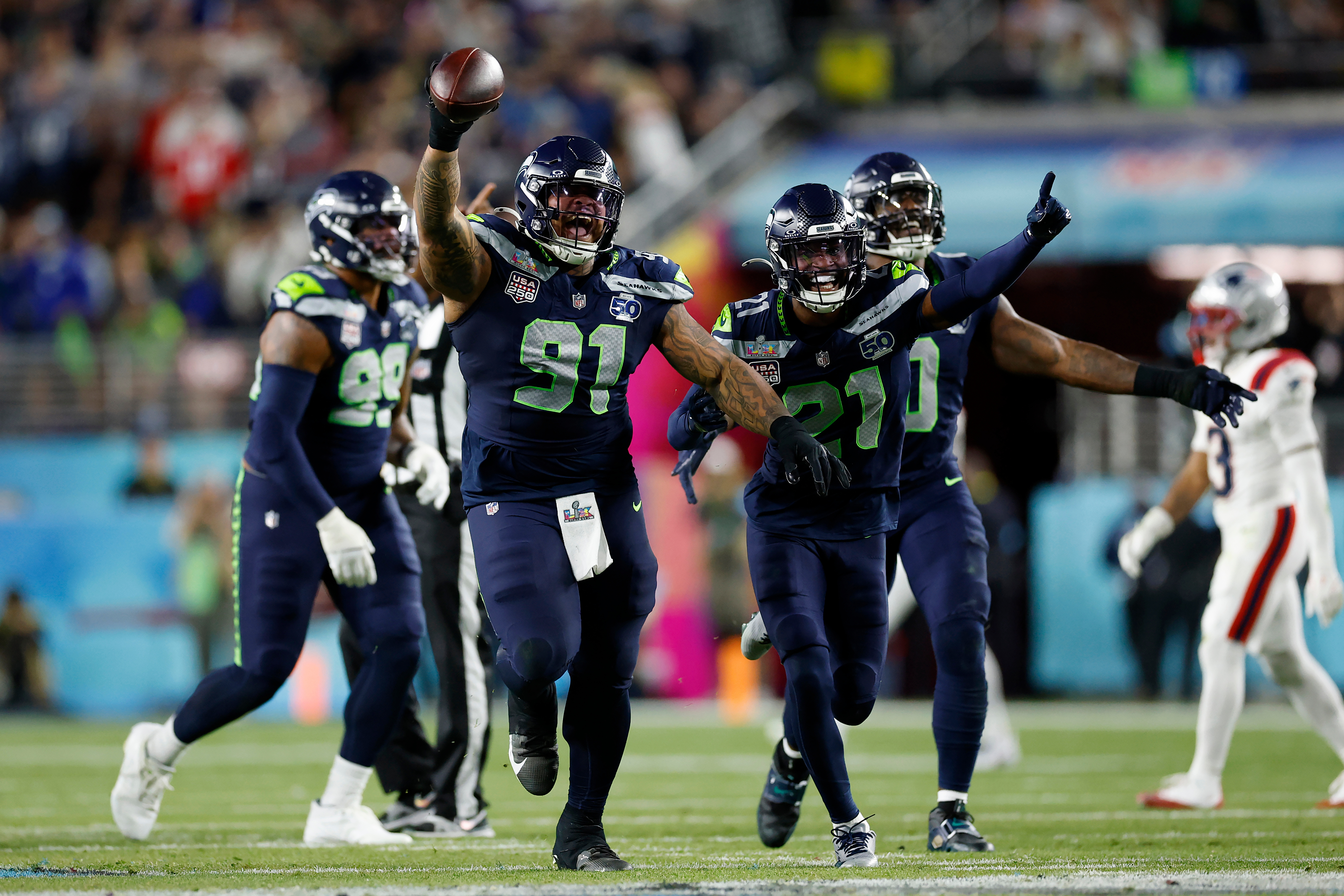 Seahawks ride their 'Dark Side' defense to a Super Bowl title, pounding the Patriots 29-13
