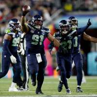 Seahawks ride their 'Dark Side' defense to a Super Bowl title, pounding the Patriots 29-13