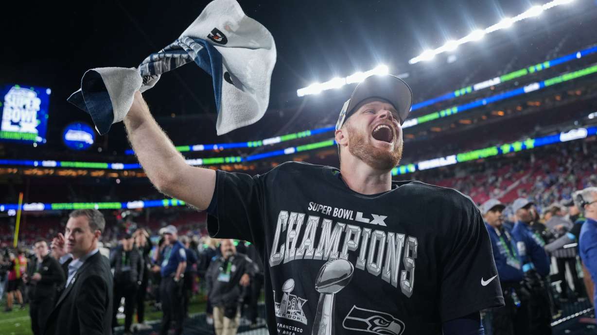 Seattle Seahawks quarterback Sam Darnold celebrates after a win over the New England Patriots in the NFL Super Bowl 60 football game, Sunday, Feb. 8, 2026, in Santa Clara, Calif.