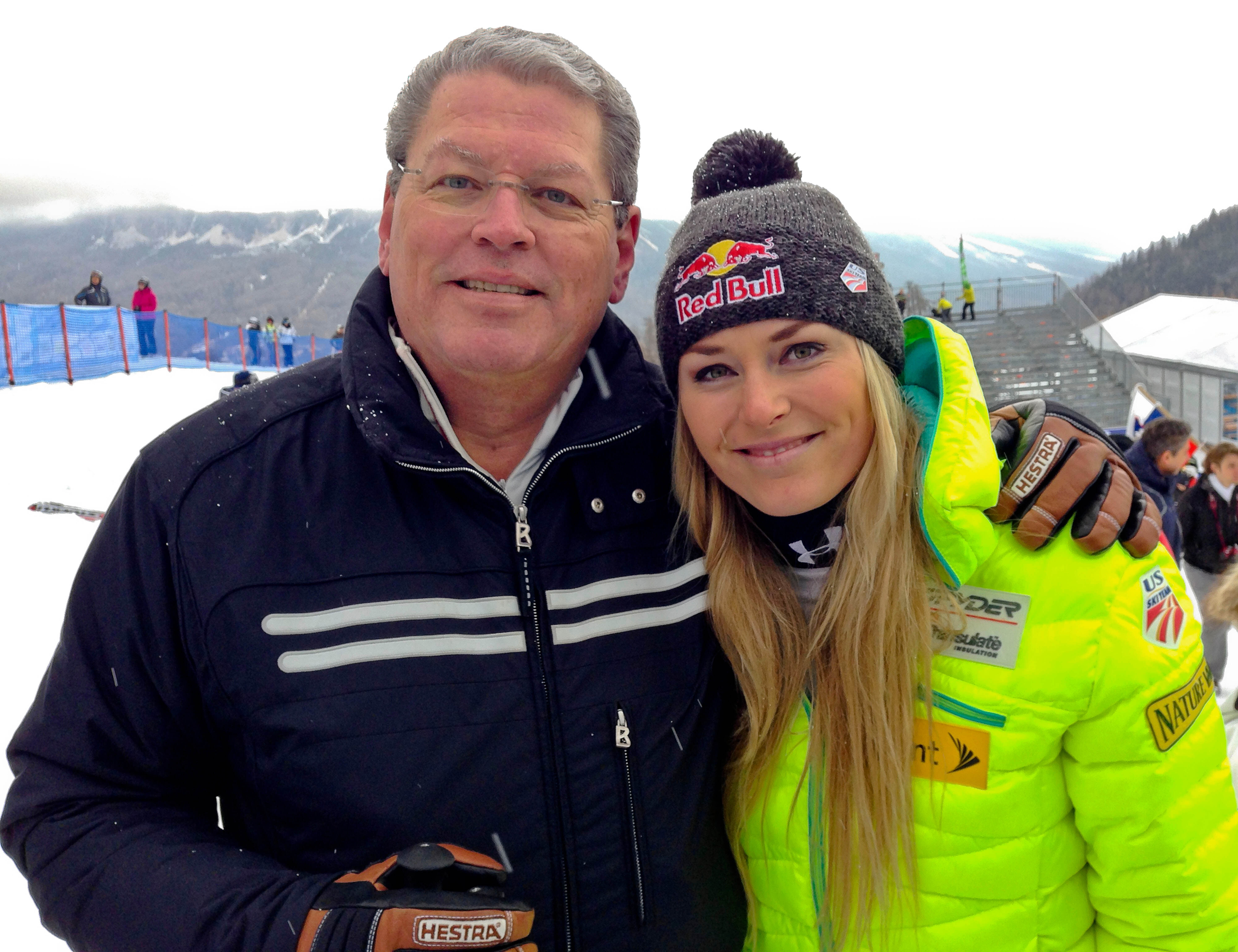 FILE - United States' Lindsey Vonn, right, poses for photographs with her father Alan Kildow at the end of an alpine ski, women's World Cup downhill race, in Cortina d'Ampezzo, Italy, Friday, Jan. 16, 2015. 