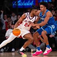 Pitino climbs career wins list as No. 17 St. John's fends off Xavier 87-82 in overtime