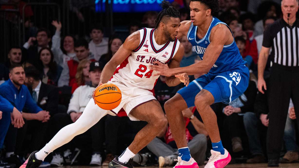 St. John's forward Zuby Ejiofor (24) drives toward the basket during the first half of an NCAA college basketball game against Xavier, Monday, Feb. 9, 2026, in New York.