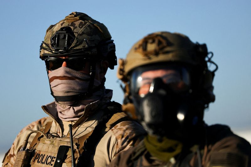 US judge rejects California law that banned masks for federal officers