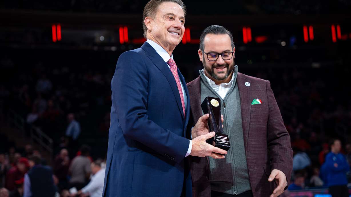 St. John's head coach Rick Pitino receives an award from the Italian Heritage Society of Long Island before an NCAA college basketball game against Xavier, Monday, Feb. 9, 2026, in New York.