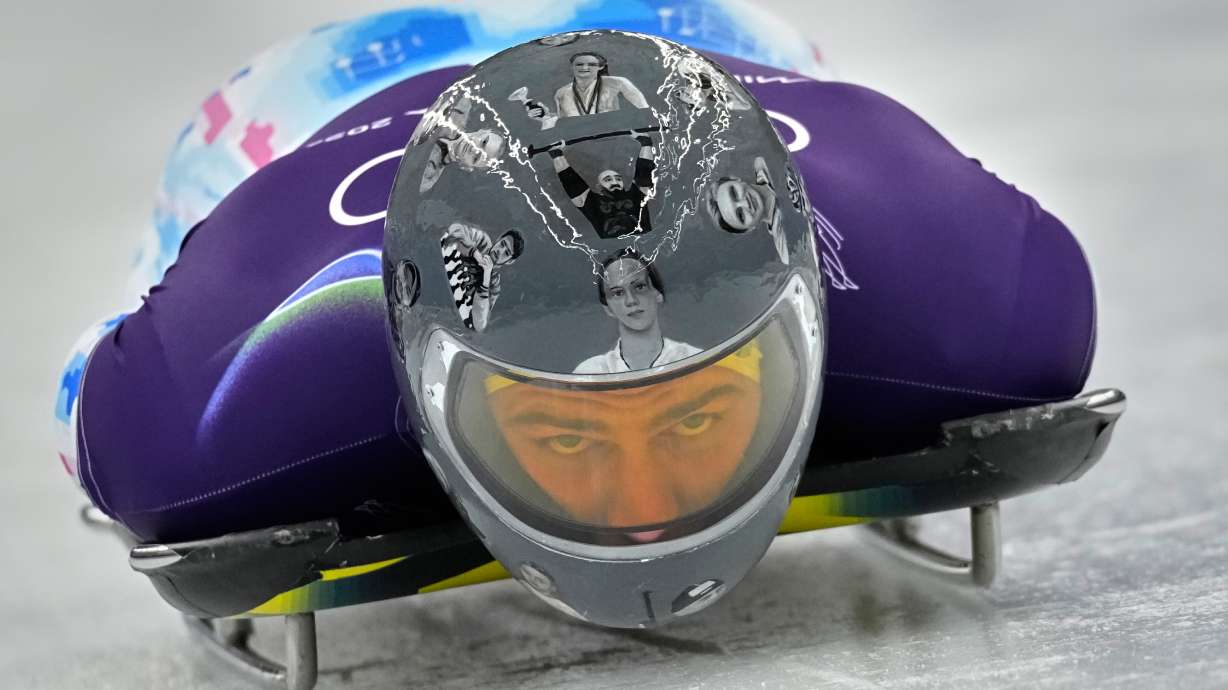 Ukraine's Vladyslav Heraskevych starts a men's skeleton training session at the 2026 Winter Olympics, in Cortina d'Ampezzo, Italy, Monday, Feb. 9, 2026.