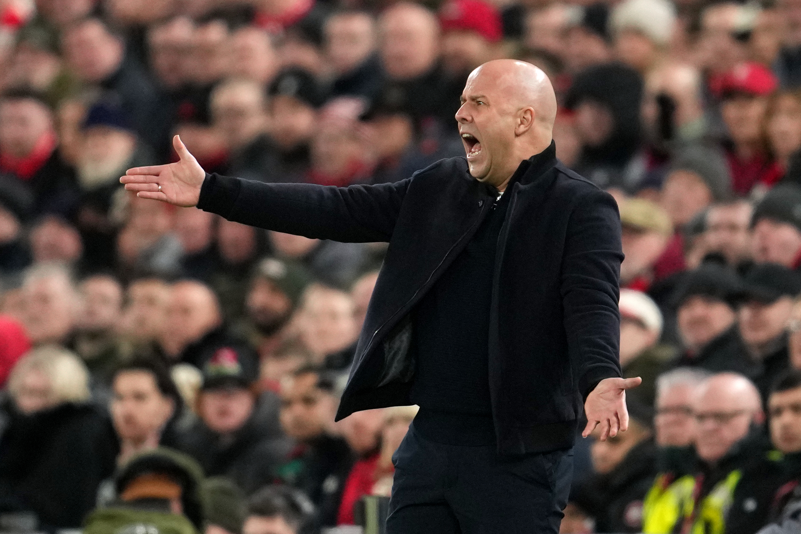 Liverpool's manager Arne Slot gestures during the English Premier League soccer match between Liverpool and Newcastle in Liverpool, England, Saturday, Jan. 31, 2026.