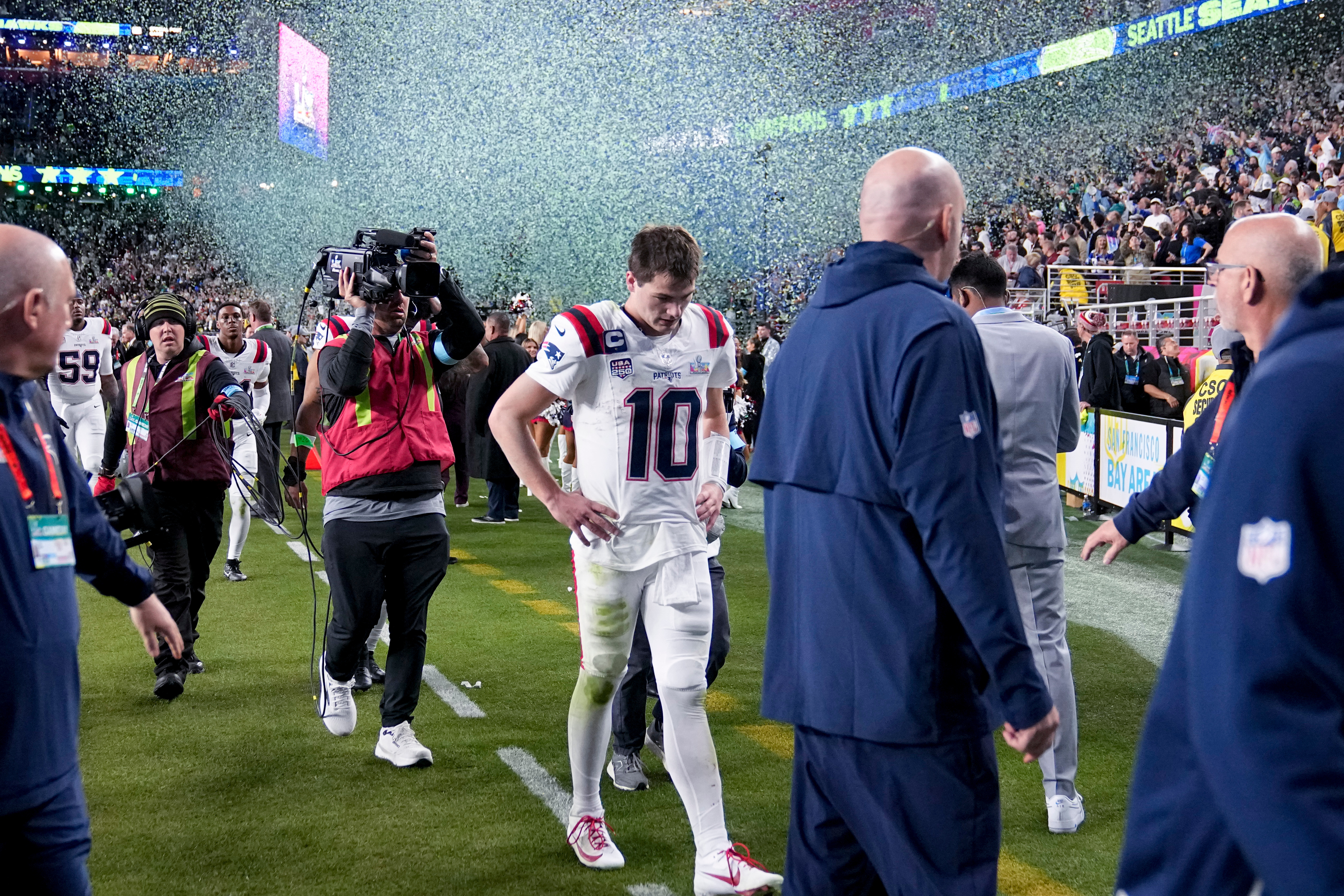 New England Patriots quarterback Drake Maye walks off the field after losing to the Seattle Seahawks in the NFL Super Bowl 60 football game, Sunday, Feb. 8, 2026, in Santa Clara, Calif. 
