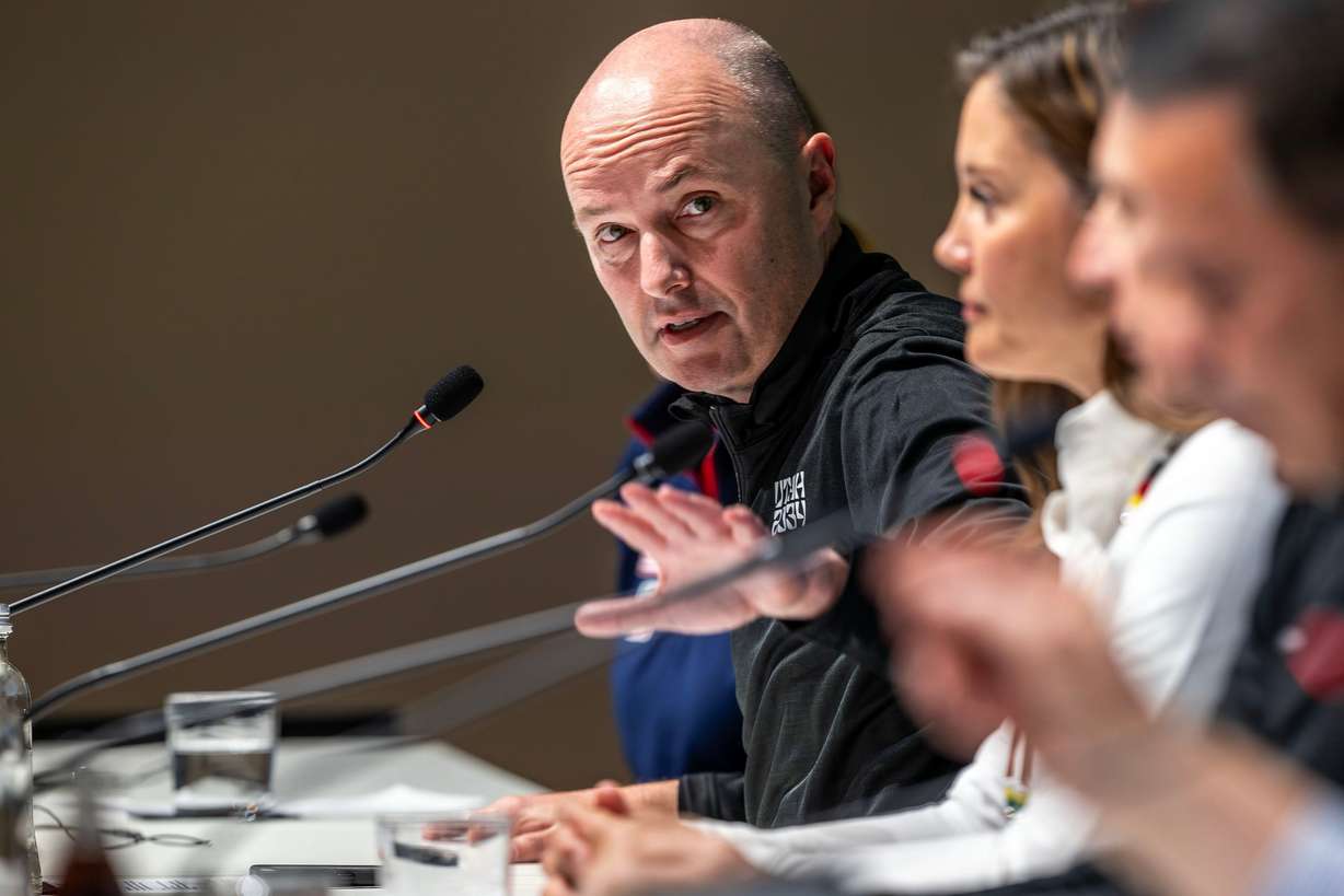 Utah Gov. Spencer Cox answers a question as he and other 2034 Utah Winter Olympic Games organizers participate in a press conference in the main media center for the 2026 Milan Cortina Winter Olympics in Milan, Italy, on Tuesday. Cox said he is grateful to live in a country where people are able to speak their minds, even Olympic athletes.