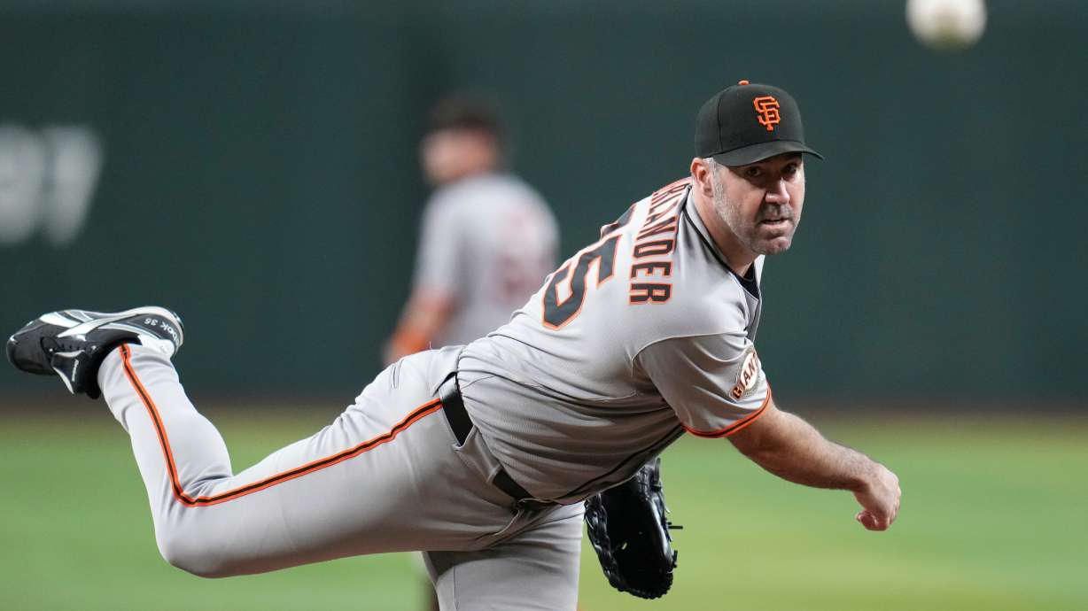 FILE - San Francisco Giants starting pitcher Justin Verlander warms up during the first inning of a baseball game against the Arizona Diamondbacks Wednesday, Sept. 17, 2025, in Phoenix.