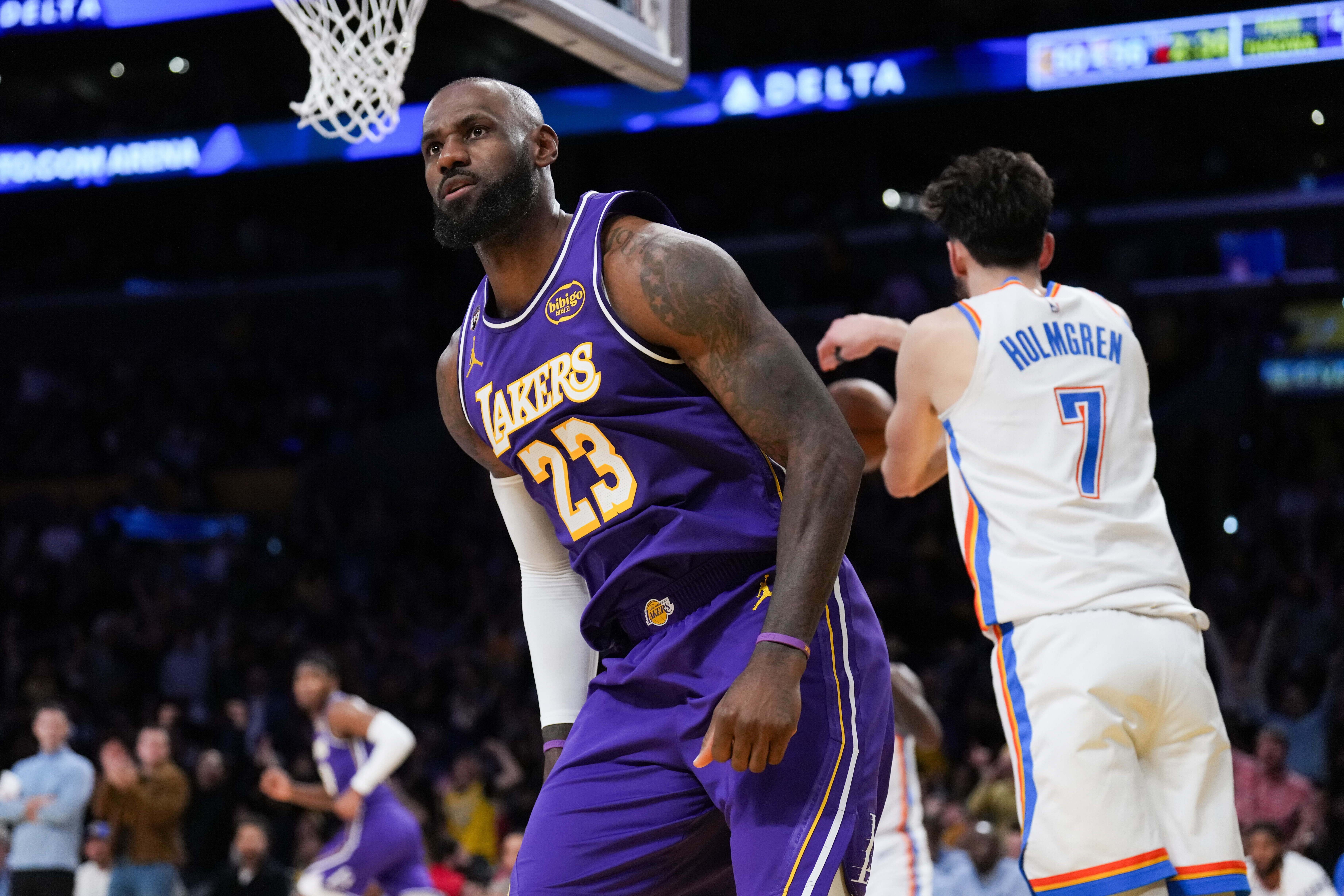 Los Angeles Lakers forward LeBron James (23) reacts after making a dunk during the first half of an NBA basketball game against the Oklahoma City Thunder Monday, Feb. 9, 2026, in Los Angeles. 