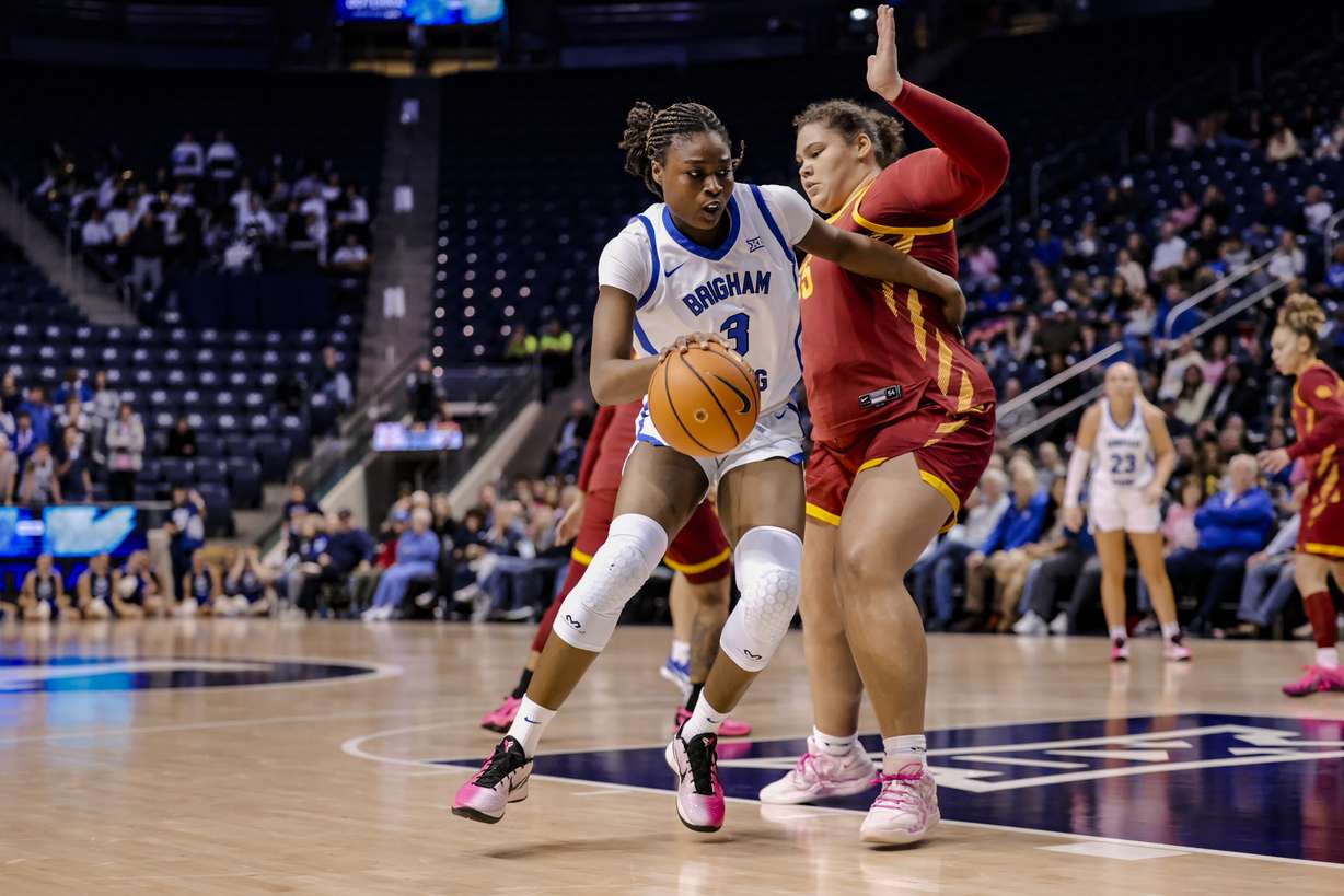 BYU forward Bolanle Yussuf drives against Audi Crooks during a Big 12 women's basketball against Iowa State, Tuesday, Feb. 10, 2026 at the Marriott Center in Provo, Utah.