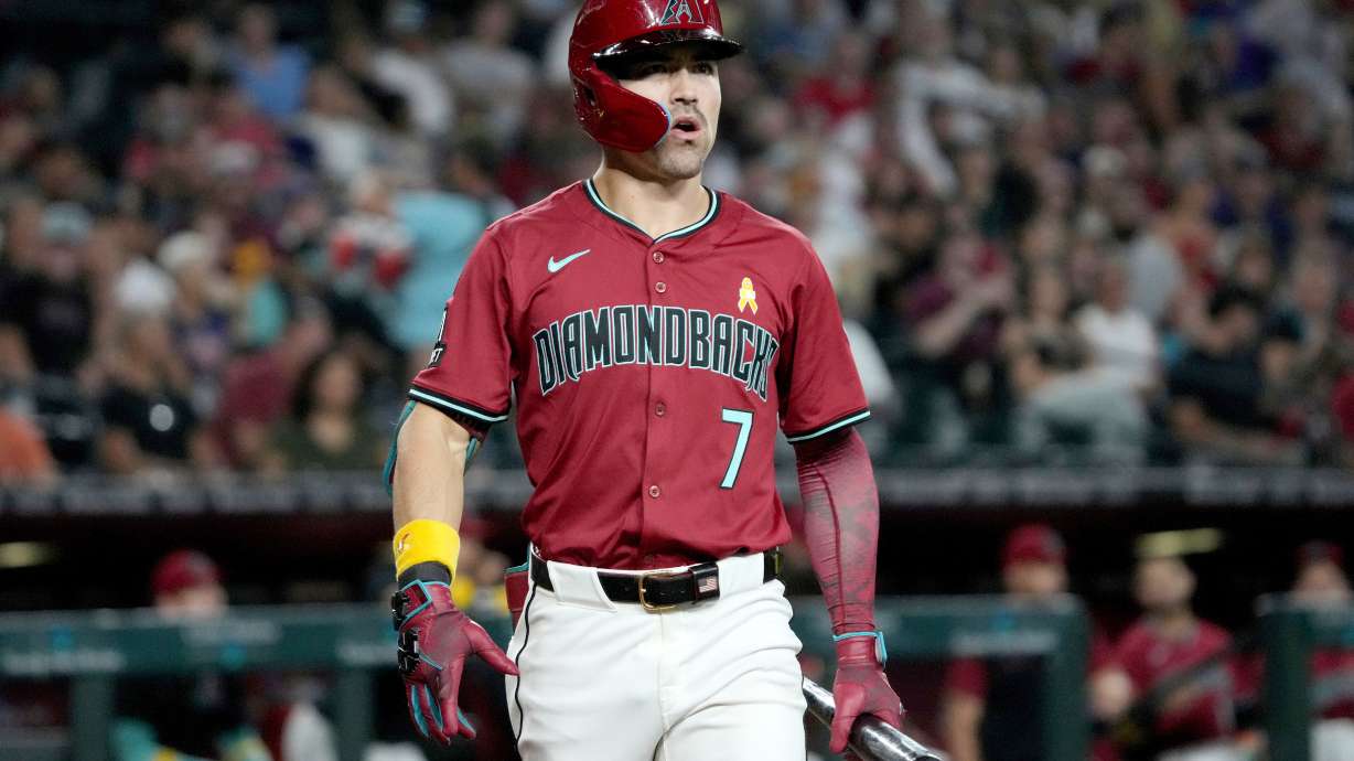 FILE - Arizona Diamondbacks' Corbin Carroll (7) reacts during the first inning of a baseball game against the Boston Red Sox, Sunday, Sept 7, 2025, in Phoenix.