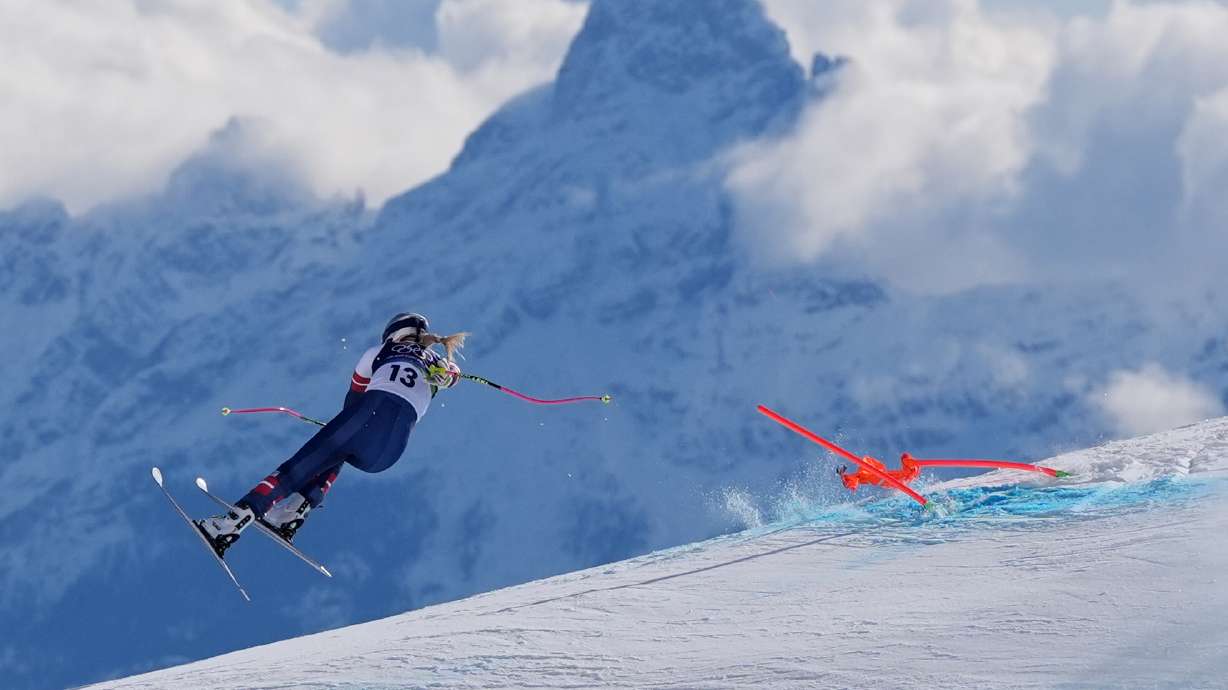 United States' Lindsey Vonn crashes during an alpine ski women's downhill race, at the 2026 Winter Olympics, in Cortina d'Ampezzo, Italy, Sunday, Feb. 8, 2026.