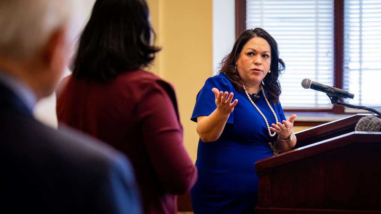 Utah Senate Minority Leader Luz Escamilla, D-Salt Lake City, speaks with Rep. Sandra Hollins, D-Salt Lake City, center, and Jeff Olson, a member of the Westside Coalition, to discuss the proposed state homeless campus at the Capitol on Wednesday.