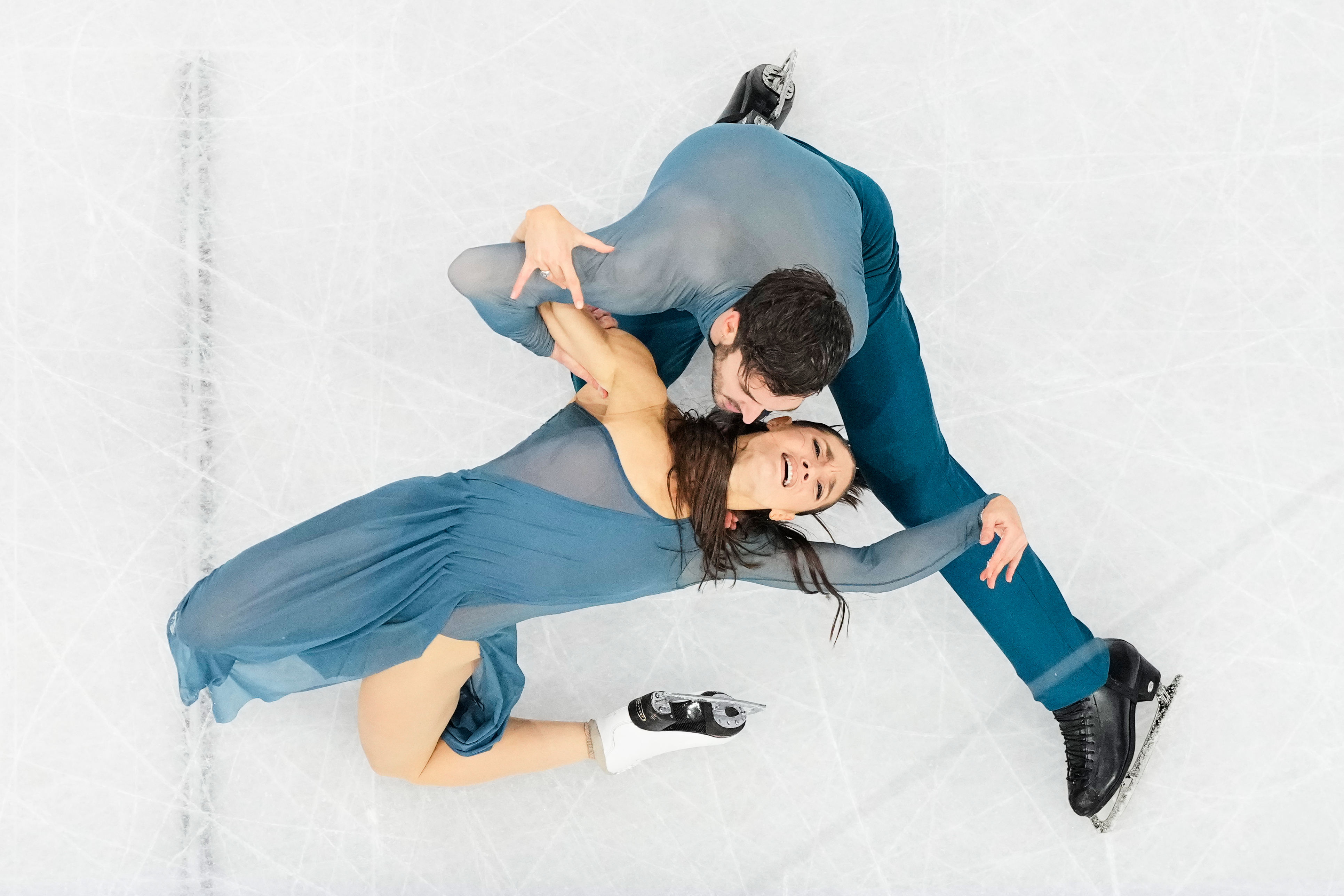 Laurence Fournier Beaudry and Guillaume Cizeron of France compete during the ice dancing free skate in figure skating at the 2026 Winter Olympics, in Milan, Italy, Wednesday, Feb. 11, 2026. 