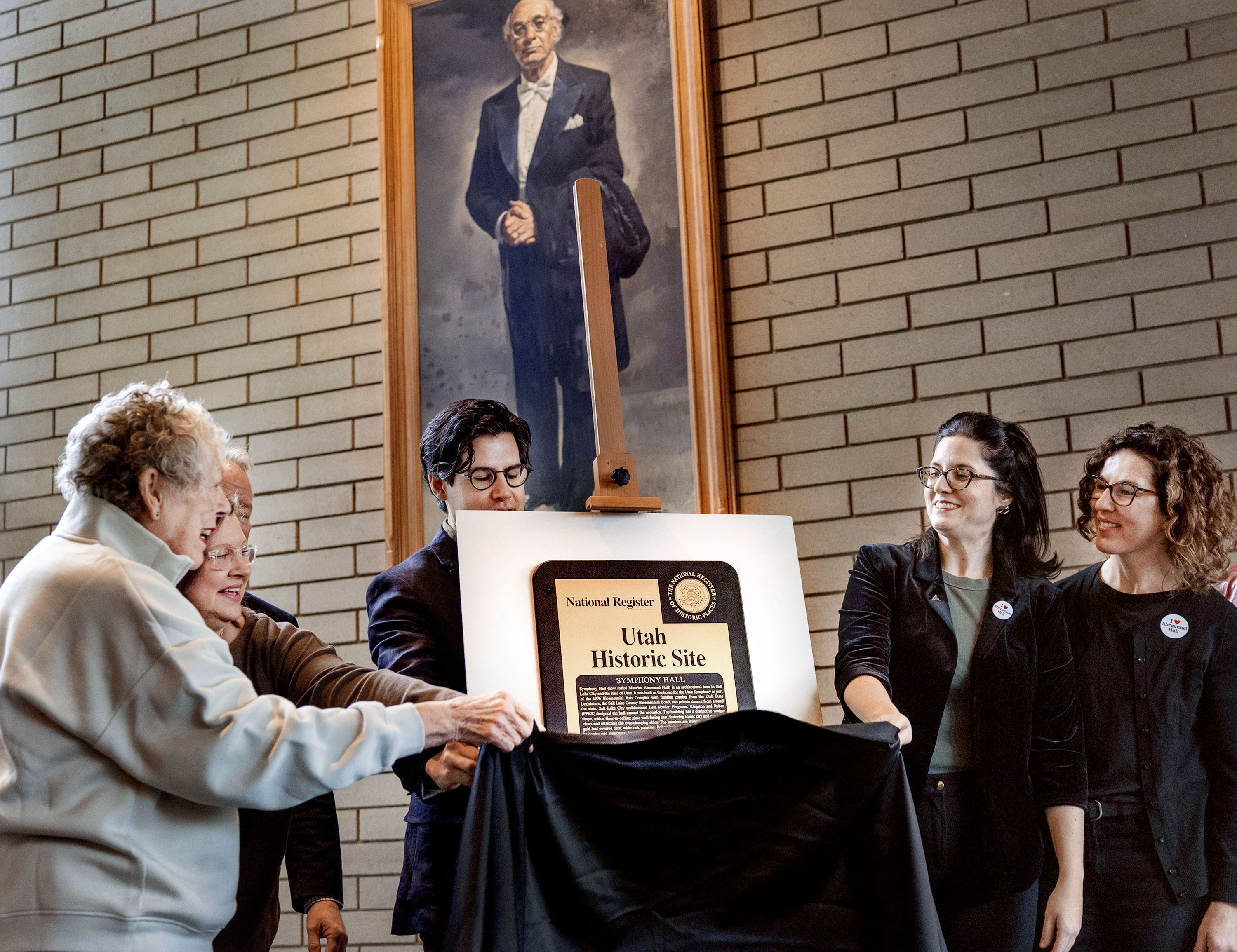 A plaque is unveiled commemorating Abravanel Hall as one of Utah’s historic sites in Salt Lake City on Wednesday.