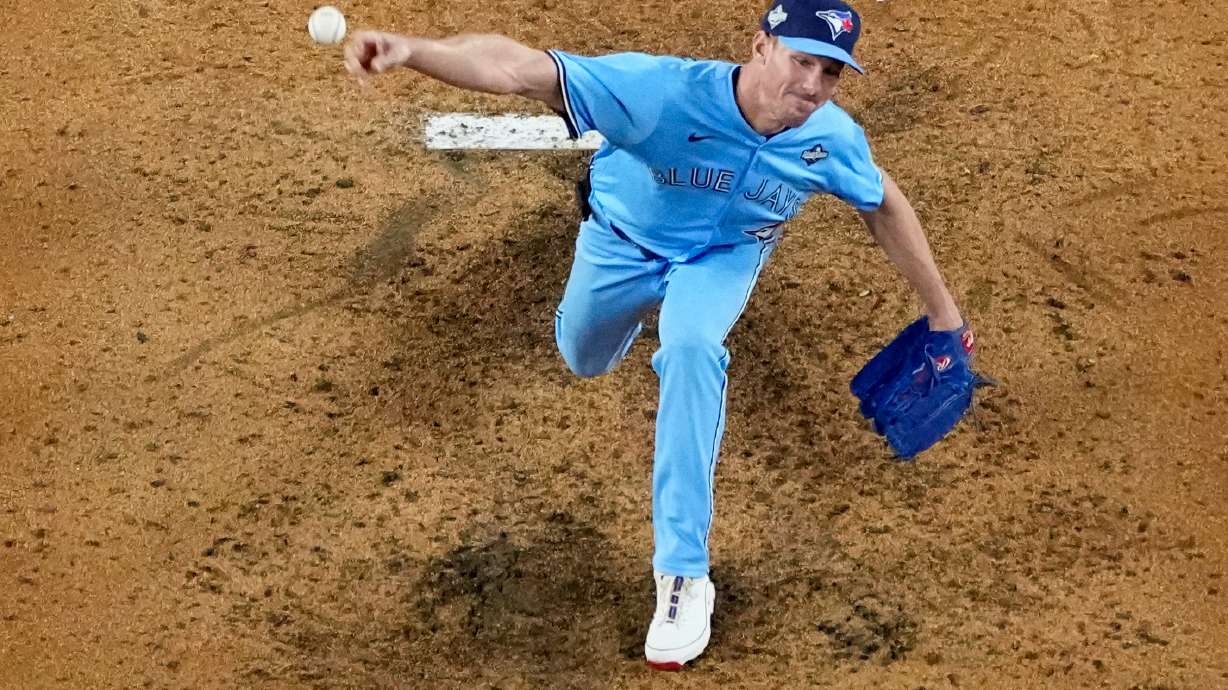 FILE - Toronto Blue Jays pitcher Chris Bassitt throws against the Los Angeles Dodgers during the seventh inning in Game 4 of baseball's World Series, Oct. 28, 2025, in Los Angeles.