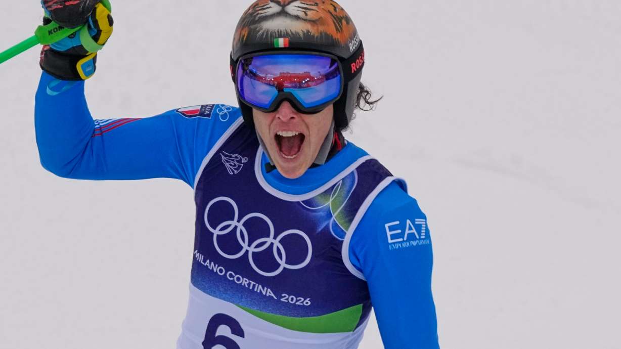 Italy's Federica Brignone at the finish area, during an alpine ski, women's super-G race, at the 2026 Winter Olympics, in Cortina d'Ampezzo, Italy, Thursday, Feb. 12, 2026.