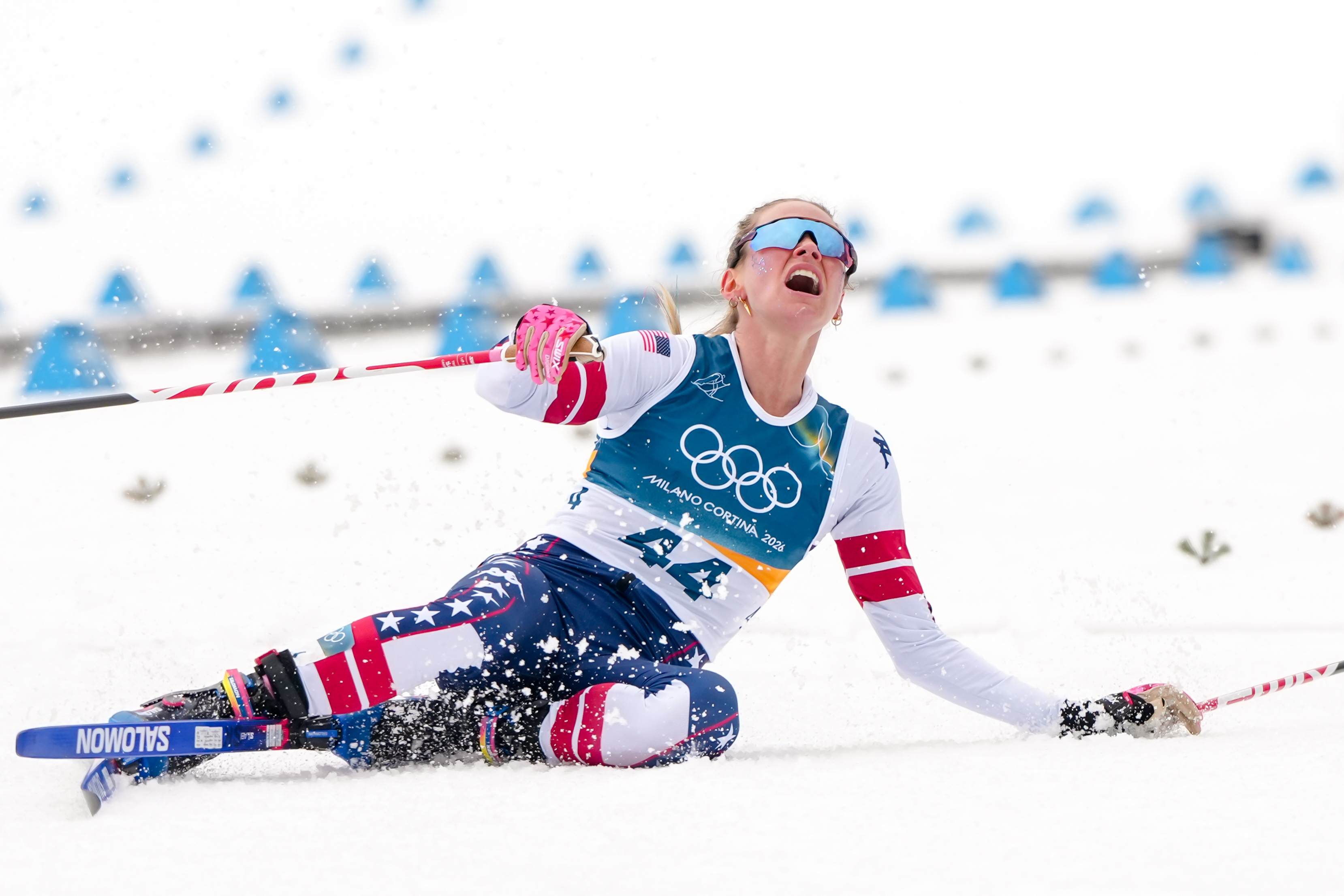 Jessie Diggins fights injury to take bronze in race dominated by Sweden at Milan Cortina Games