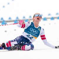 Jessie Diggins fights injury to take bronze in race dominated by Sweden at Milan Cortina Games