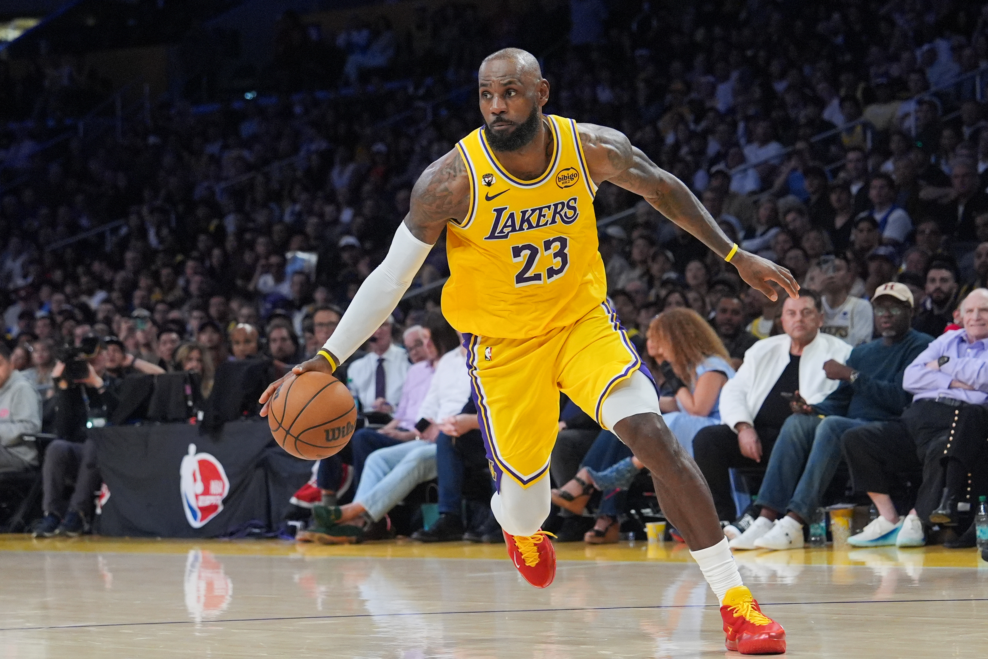 Los Angeles Lakers forward LeBron James drives to the basket during the second half of an NBA basketball game against the Golden State Warriors Saturday, Feb. 7, 2026, in Los Angeles. 