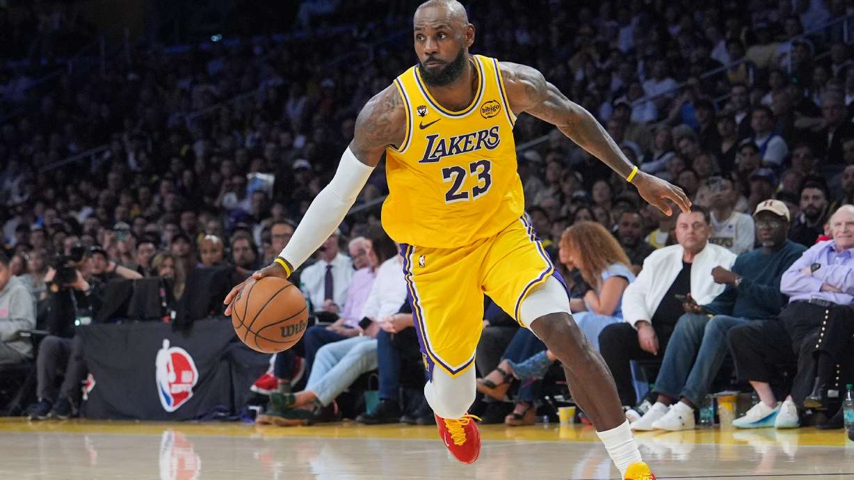 Los Angeles Lakers forward LeBron James drives to the basket during the second half of an NBA basketball game against the Golden State Warriors Saturday, Feb. 7, 2026, in Los Angeles.