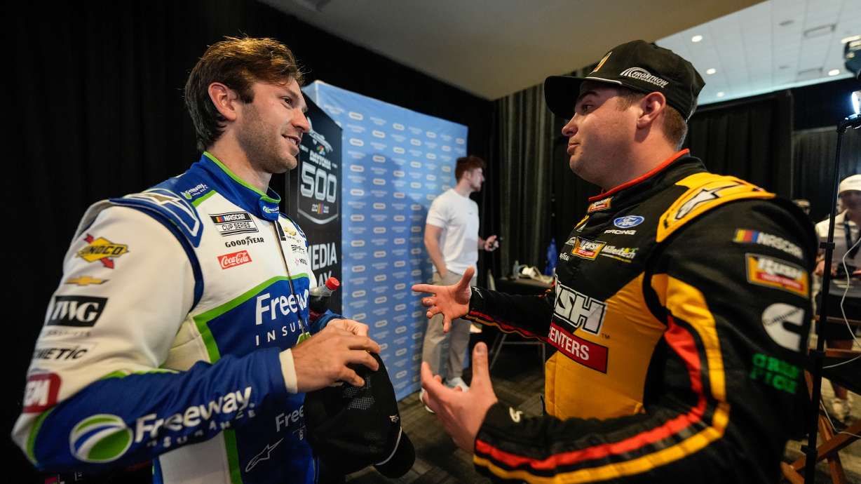 Corey LaJoie and Noah Gragson, from left, speak during a NASCAR Daytona 500 media day, Wednesday, Feb. 11, 2026, in Daytona, Fla.