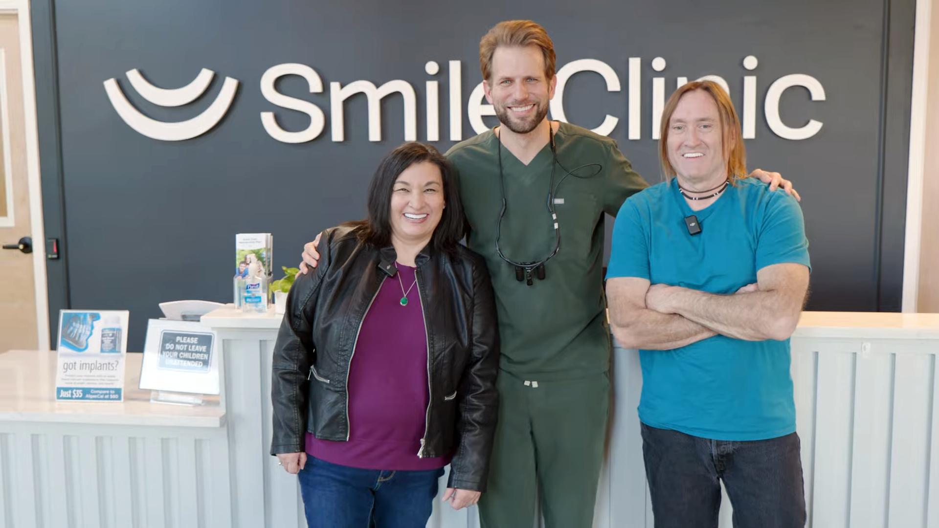 Dr. Logan Locke with a happy patient.